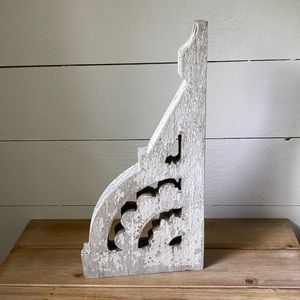 Chippy white wood architectural decor piece